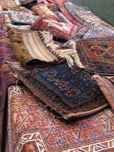 Featured is a display of oriental rugs - maybe antique rugs - taken by photographer Herman Brinkman of Amsterdam, Netherlands.